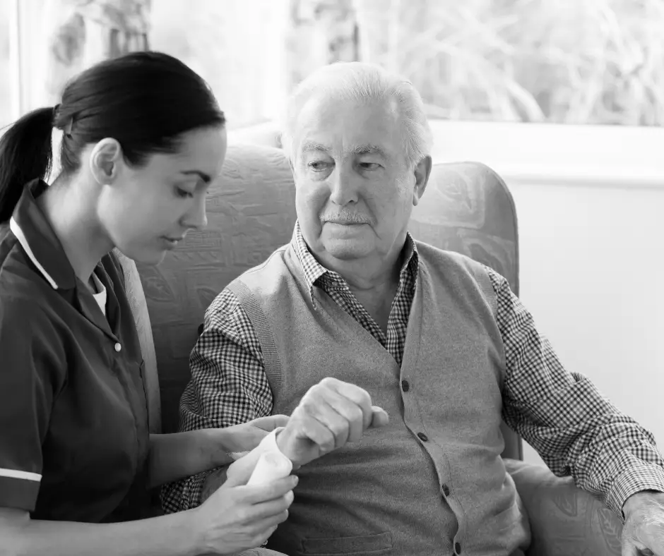 Elderly patient receiving wound care